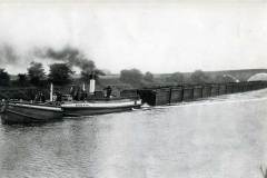 A tug, jebus No 14 and compartment boats.