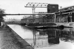 Barges at an industrial complex.