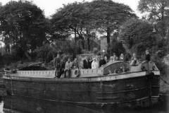 Posing for a photo aboard a barge.