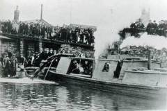 Pumping water from a sunken barge.