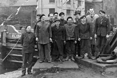 Workers posing in front of ELIZABETH B.