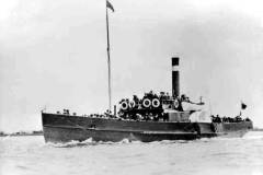 A passenger paddle steamer.