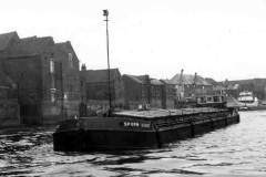 The motor barge Spurn Light on the River Trent at Gainsborough.