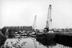 Enterprise moored by a wharf.