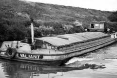 The barge Valiant under way.