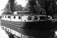 A barge converted to a houseboat.