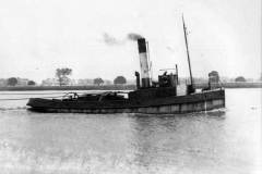 A steam tug under way.