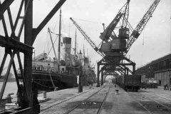 Coasters alongside in West Dock.