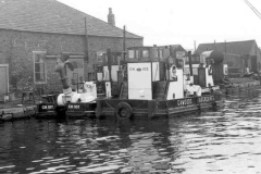 Three pusher tugs.
