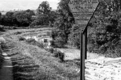 A bridge cast iron weight restriction sign.