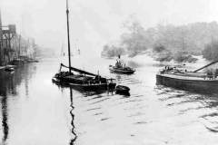 A steam tug towing a keel.