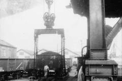 Unloading wagons of coal.