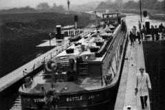 Barge Battle Stone entering a lock.