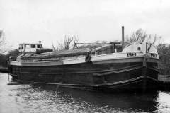 The moored motor barge LYS.