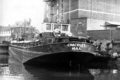 The motor barge Chaceley moored on the River Avon.