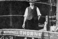 A skipper posing on the stern.