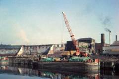 The moored barge HUNTS ROGER.