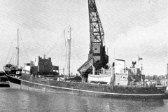 Loading a collier by crane.