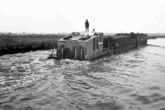 A pusher tug and BACM barges.