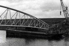 Installing a new pipe bridge.