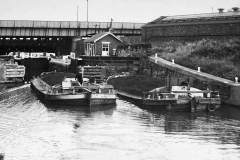 A barge entering a lock.