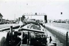 A view from the bow of a motor barge.
