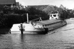 A laden motor barge.