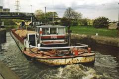 A barge leaving Ferrybridge Flood Lock.