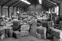Randomly stacked imported bales.