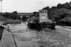 Two unladen motor barges.