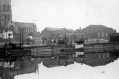 Compartment boats at a coal staithe.
