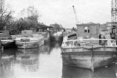 Coal barges moored at the Swinton repair yard.