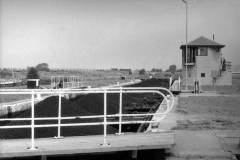 A part-train of coal laden compartment boats.
