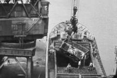 Loading coal from a railway wagon in Goole Docks.
