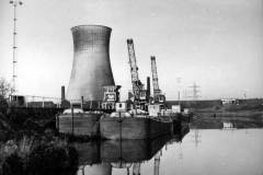 Six unladen motor barges.