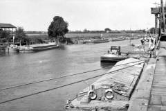 Numerous barges on the River Trent.