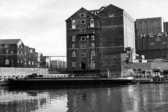 Two motor barges berthed alongside Healings Mill.