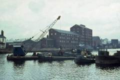 A  grab equipped dredger.