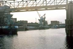 A mixture of barges at a coal staithe.
