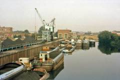 A mixture of barges at a coal staithe.