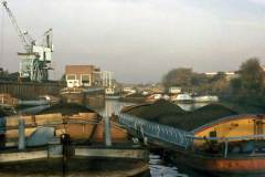 A mixture of barges at a coal staithe.