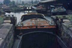 Four rusting Sheffield size dumb barges.