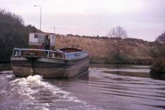 The unladen motor barge HERITAGE.