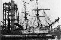 A sailing vessel loading coal in Goole Docks.
