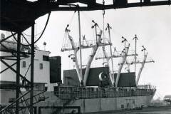 STRIJBEEK discharging heavy steel coils.