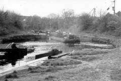 A 'West Country' size motor barge entering Thornhill Double Top Lock.