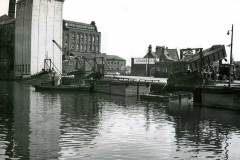 Emptying coal into a compartment boat.