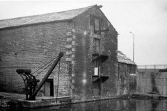 Canalside warehouse and crane, Huddersfield