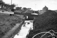 In the Figure of Three Bottom Lock.