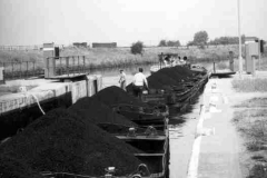 Compartment boats and a diesel tug.